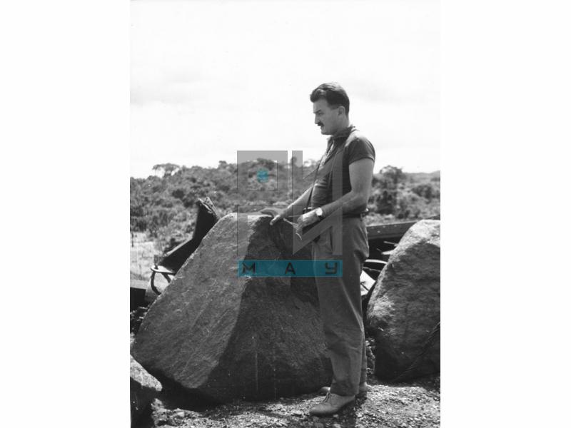 Zdravko Pecar standing next to fallen ore in Bomi Hills, Liberia (VZP.F.00002)