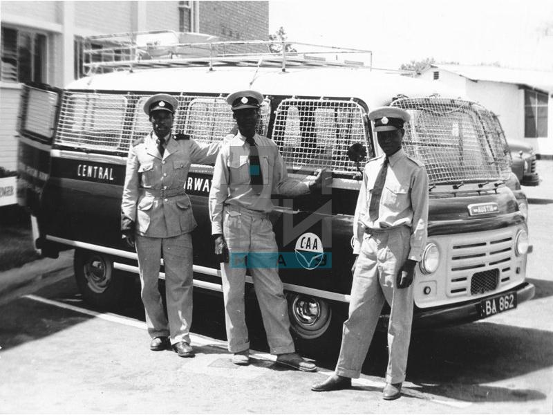 Drivers of Central African Airways (CAA) in front of the vehicle for Europeans (VZP.F.00062)